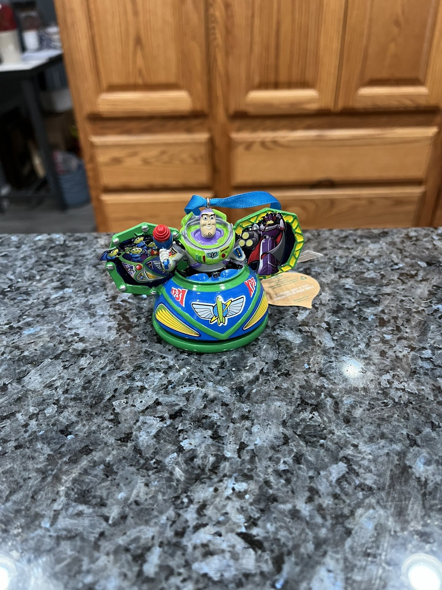 Disney Parks Toy Story Buzz Lightyear Mickey Ear Hat Christmas Ornament. The ornament spins. Brand new with tags.