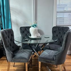 Glass Top Dining Table with 4 Gray Velvet Chairs
