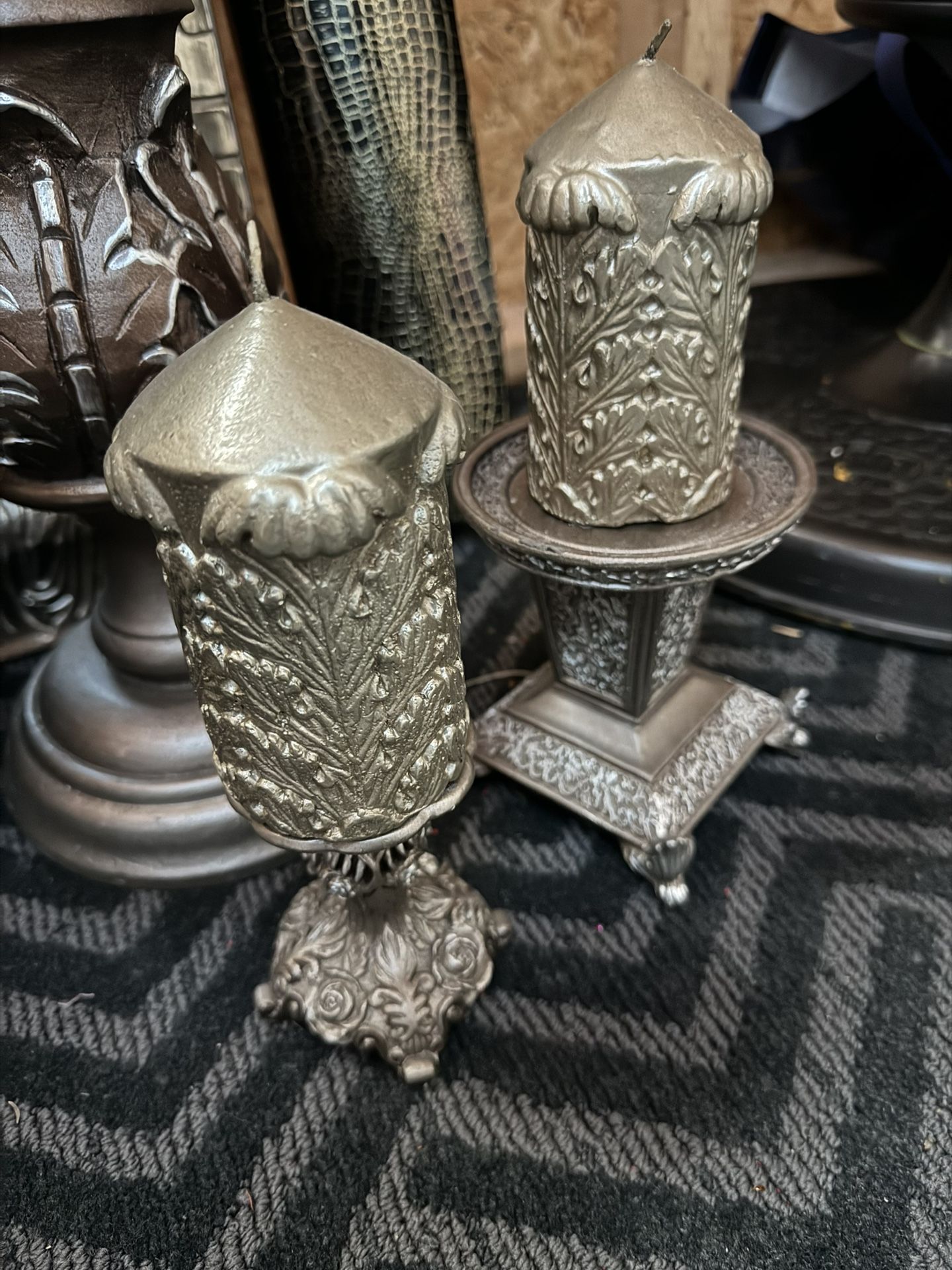 Small Candle And Candle Holder And One Is Bigger