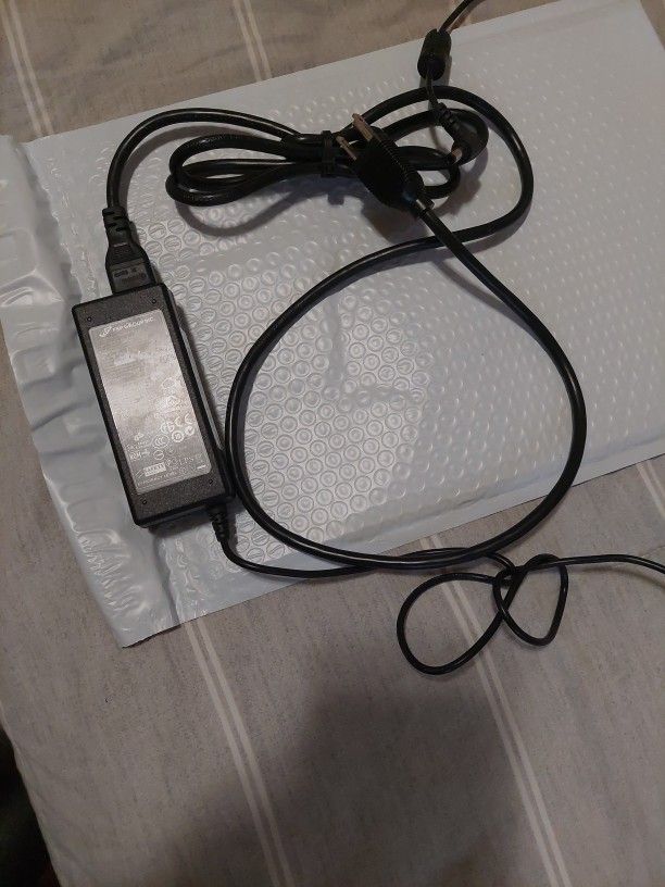 Power adapter for laptop - as is - In Working Condition