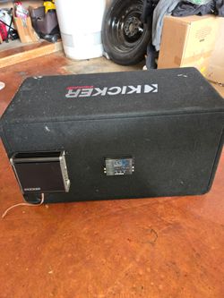 Kicker CompR dual 12" subs with Kicker CX 800W amp and an LC2 Audio control