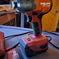 Hilti Impact Drill With Battery And Charger.