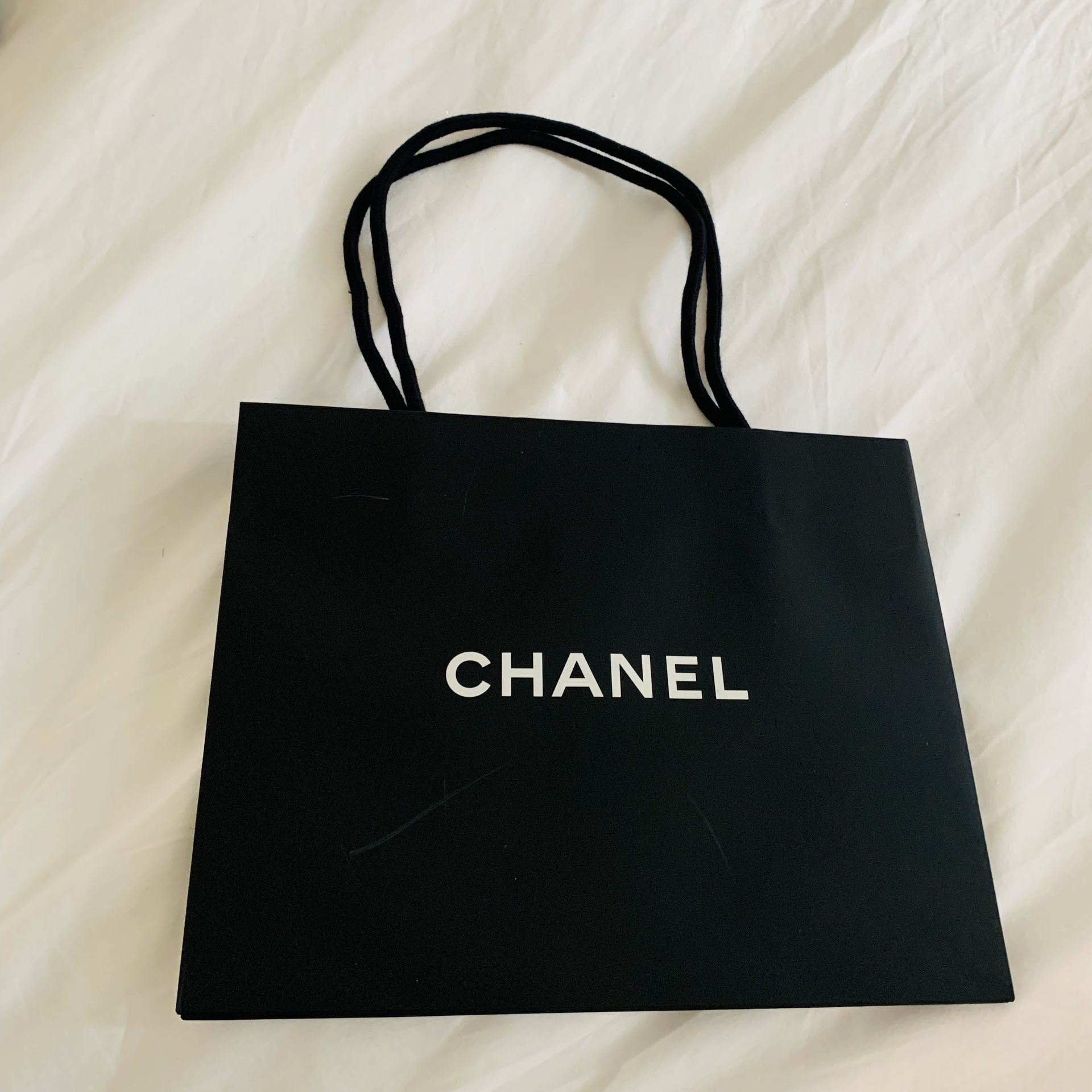 Chanel bag paper bag gift supplant