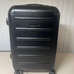 Solgaard Carry-On Closet Suitcase - Medium 20" Balearic Black Great Condition. Pre owned in good condition with some cosmetic blemishes such as minor 