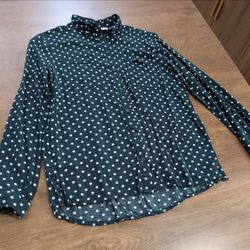 Dark green long-sleeve button-up shirt with white polka dots