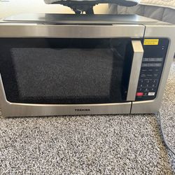 Toshiba EM131A5C series countertop microwave oven