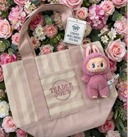 Trader Joe’s bag with Labubu