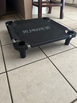 DOG ELEVATED COT  “SIT MEANS SIT” 22in x 22in x 5.25in H IN GREAT CONDITION