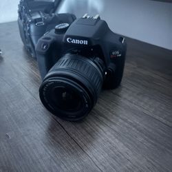 Canon EOS Rebel T100 DSLR Camera w/ 18-55mm Kit Lens + Battery