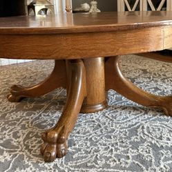 Solid Oak Round Coffee Table With Pedestal Base.  Beautiful and in great condition  $100 