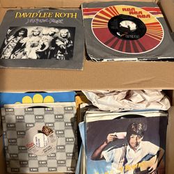 Lot of Vintage classic rock & other variety 45 RPM vinyl Albums over 200 some sleeves some not  I acquired these from a storage unit I took over I hav