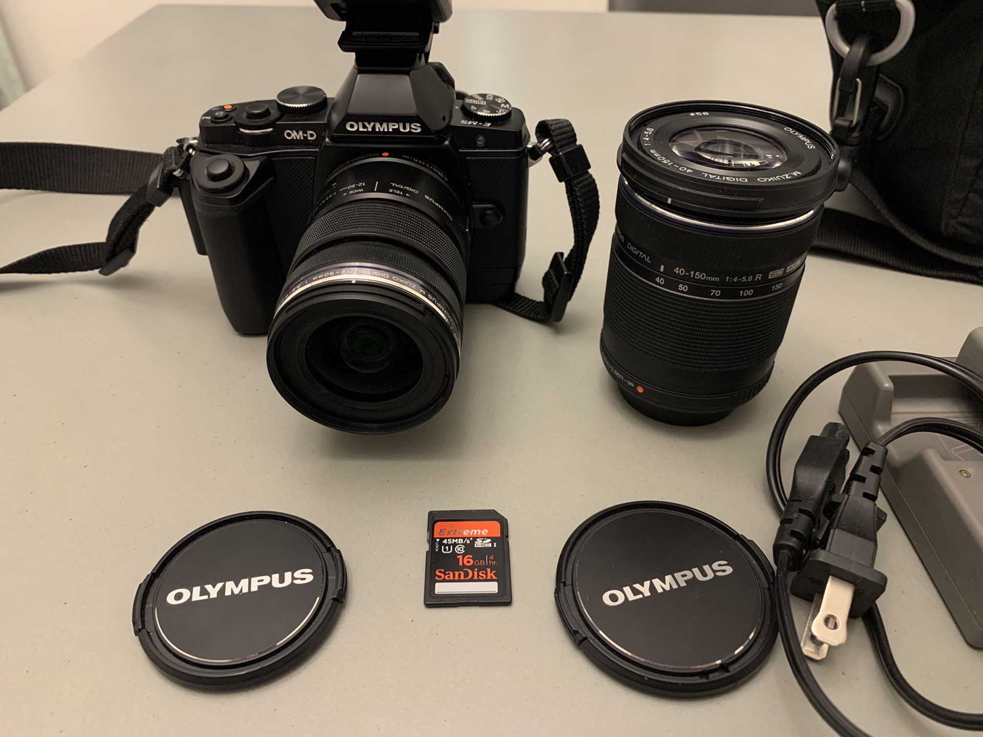 Olympus OM-D E-M5 Mirrorless Micro 4/3 W/12-50mm Lens 40-150 Lens Battery Grip