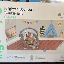Ingenuity Twinkle Tails Vibrating Infant Baby Bouncer with Lightning yToy Bar and Pillow
