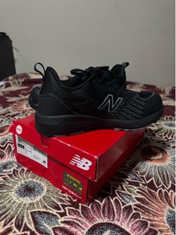New balance safety shoe / steel toe