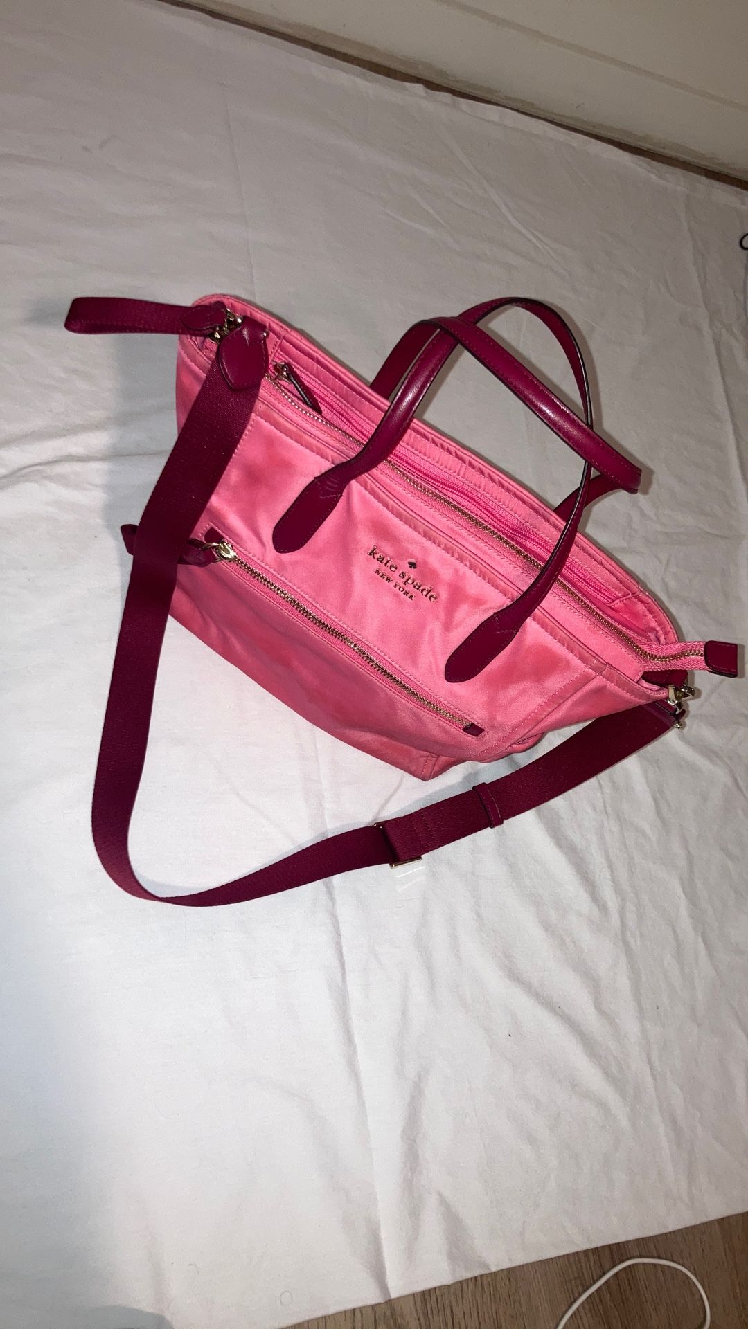 The Kate Spade Chelsea Medium Top Zip Satchel Crossbody Nylon bag in Pink Dahli