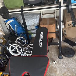 Weight Bench With Bar, Dumbells, 65 Pounds Of Weights