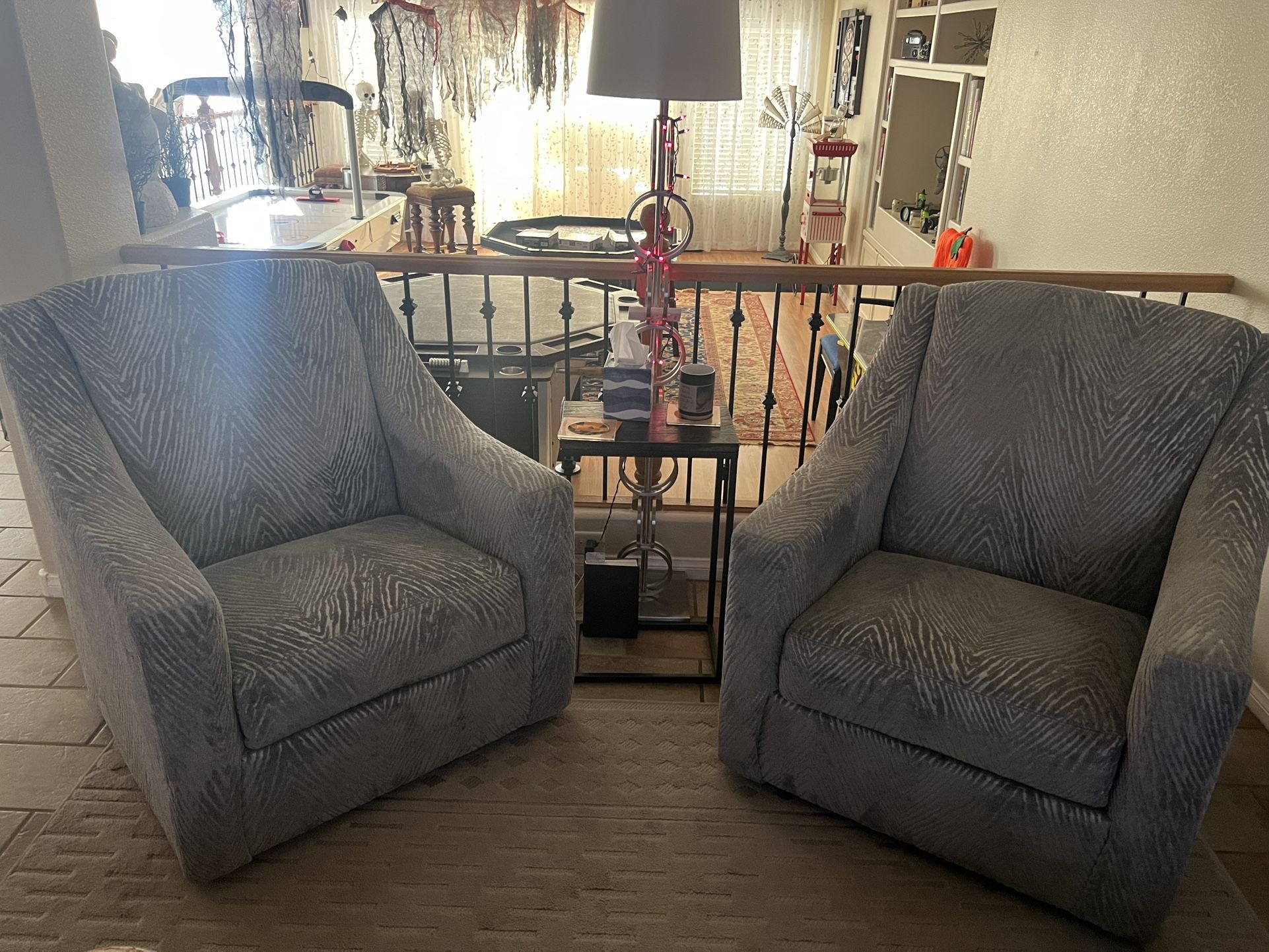 Pair of Gray swivel Armchairs