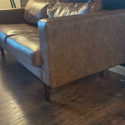 Faux Leather Sofa. 
