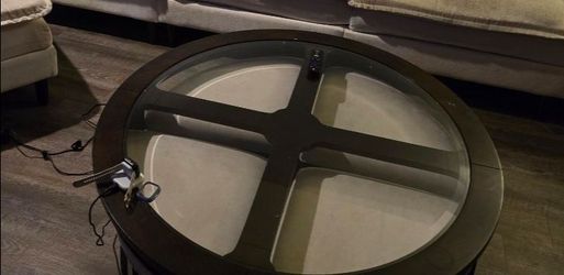 Glass top coffee table with stools
