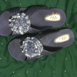 One Pair Of Blue Were Shoe  Color Blue With Flower In The Middle  Size 8-9   Brand Name  Elli