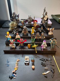 Lego figures toys - $4 each ( all 22 for $70 with display podium