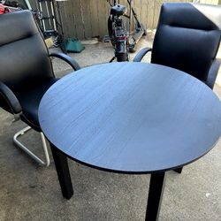 two very comfortable chairs and a table 