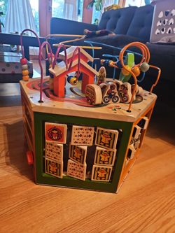 B. Toys Wooden Multi-facing Toddler Activity "cube"