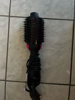 Black & pink Revlon  One-step Hair dryer and volumizer