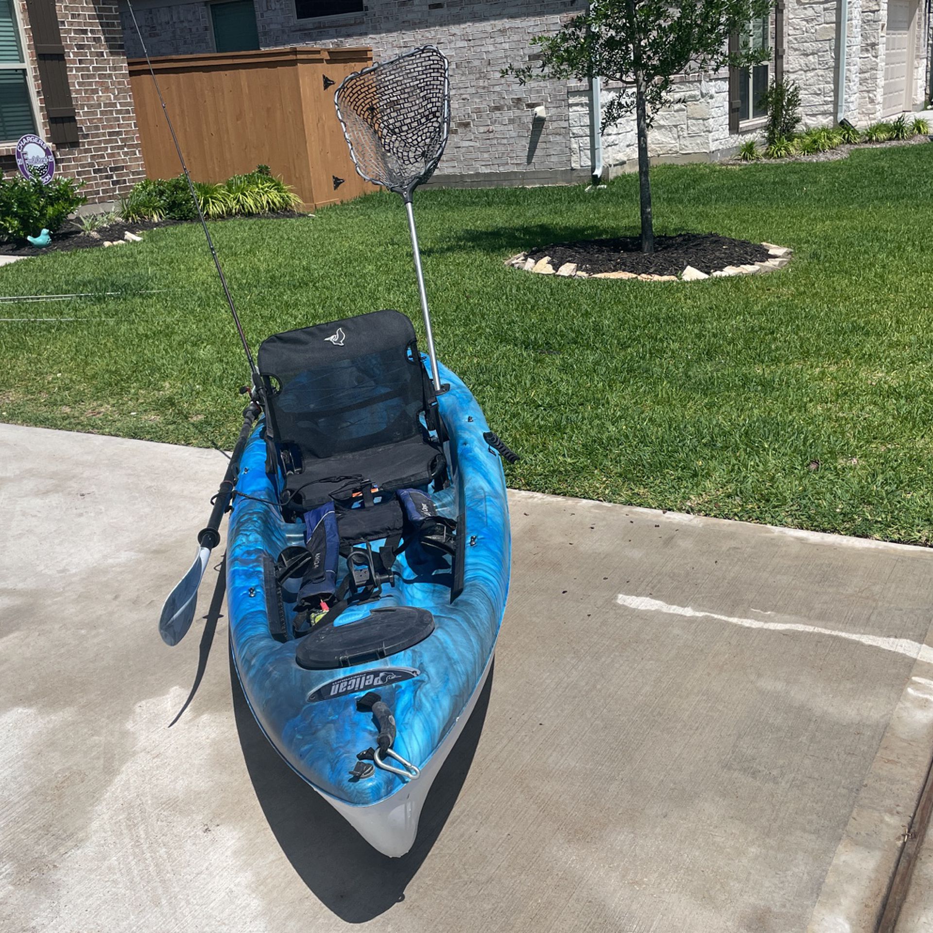 Pelican Kayak With Fishing Gear and Lifevest