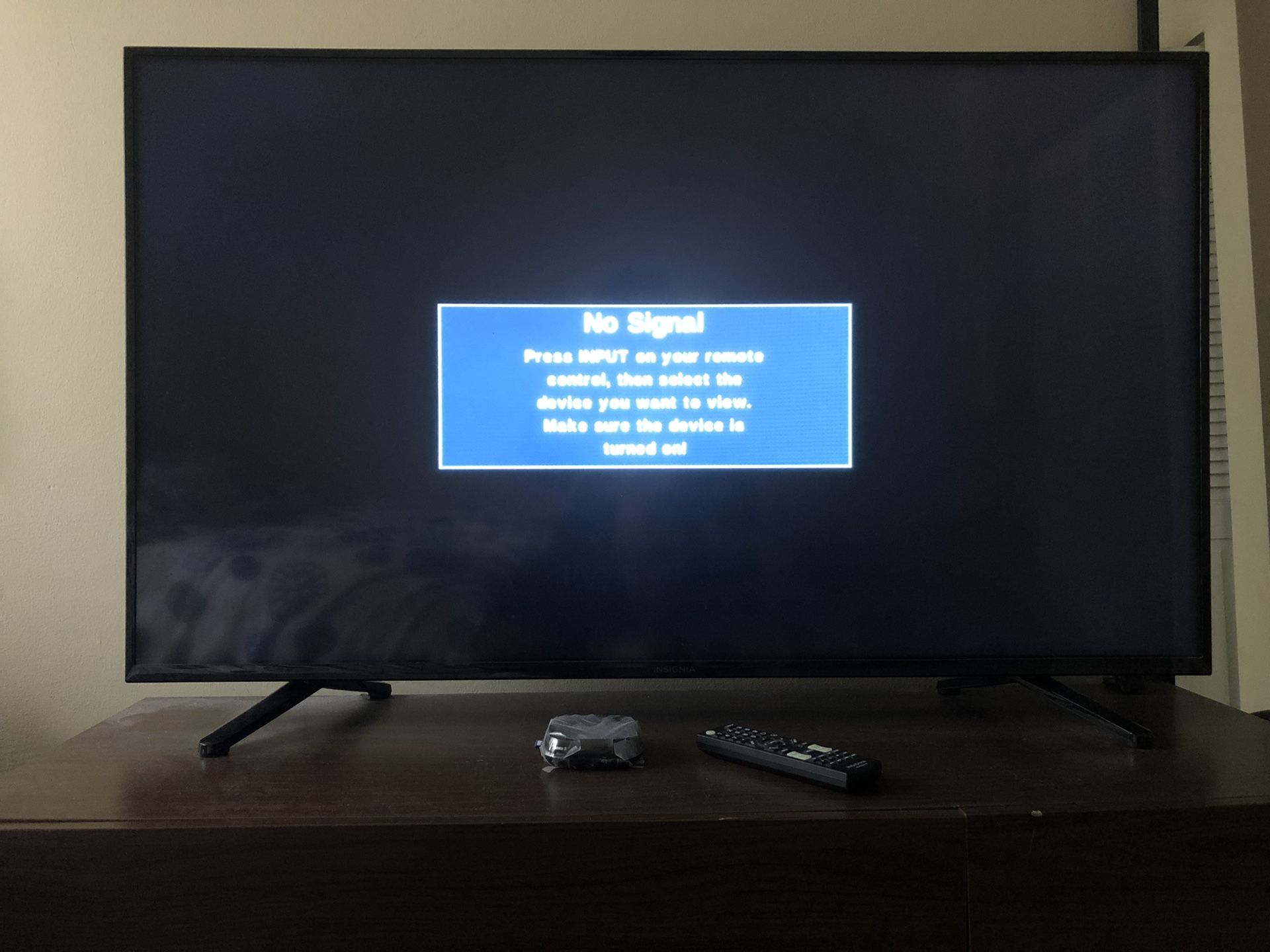 Insignia 50’ with roku and remote BARELY USED!! collecting dust...