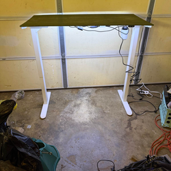 Green electric sit to stand desk with LED lights