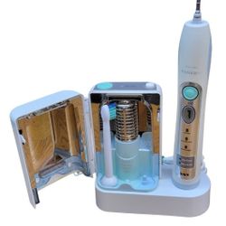 A Set Of Philips Sonicare FlexCare Rechargeable Electric Toothbrush And UV Sanitizer