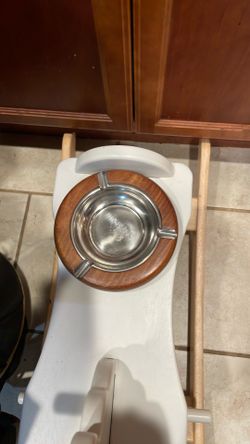 Wood and metal ashtray.