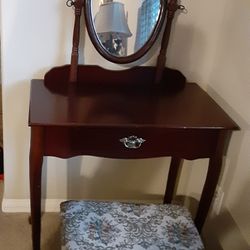 Beautiful Table With  A  Mirror And Chair. 