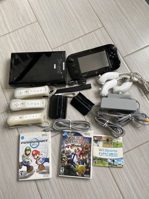 Photo Nintendo Wii U in perfect condition. No scratches. Not much used.