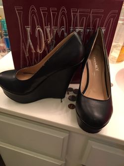 Brand new black wedges