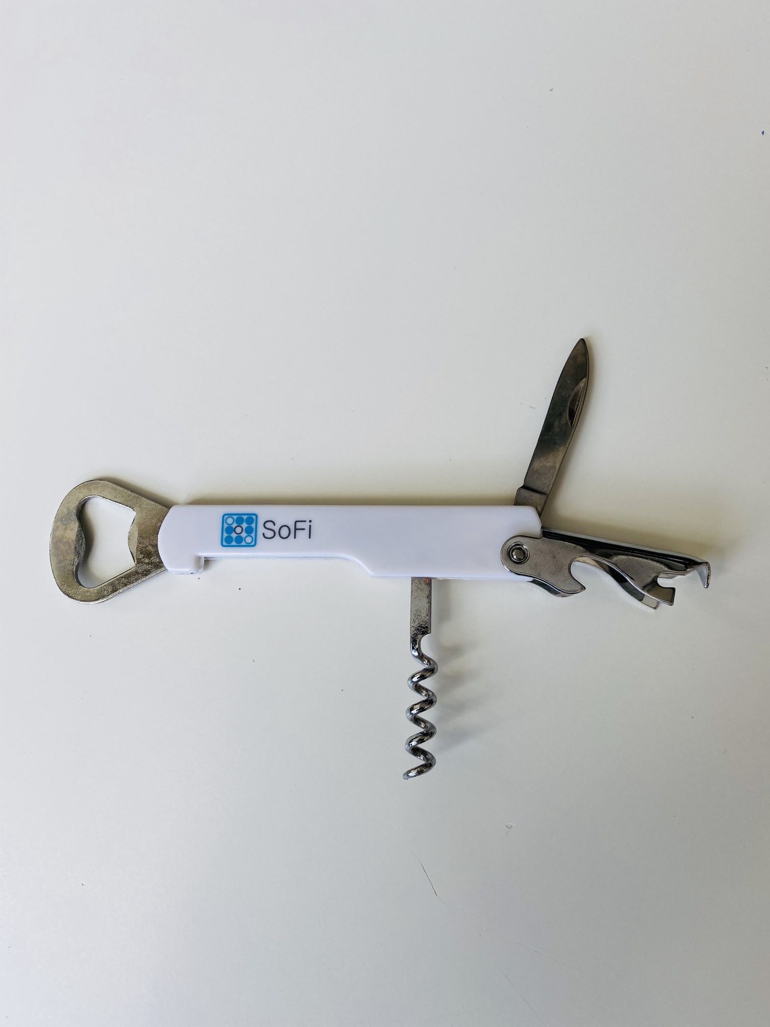 Stainless Corkscrew-Bottle Opener. New. Never used. Very efficient do-it-all 4-tools instrument. Ergonomic handle. 4-turn worm. Integrated foil cutter
