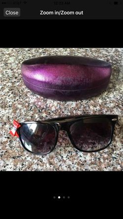 Nice cute sunglass with red ribbon on one side