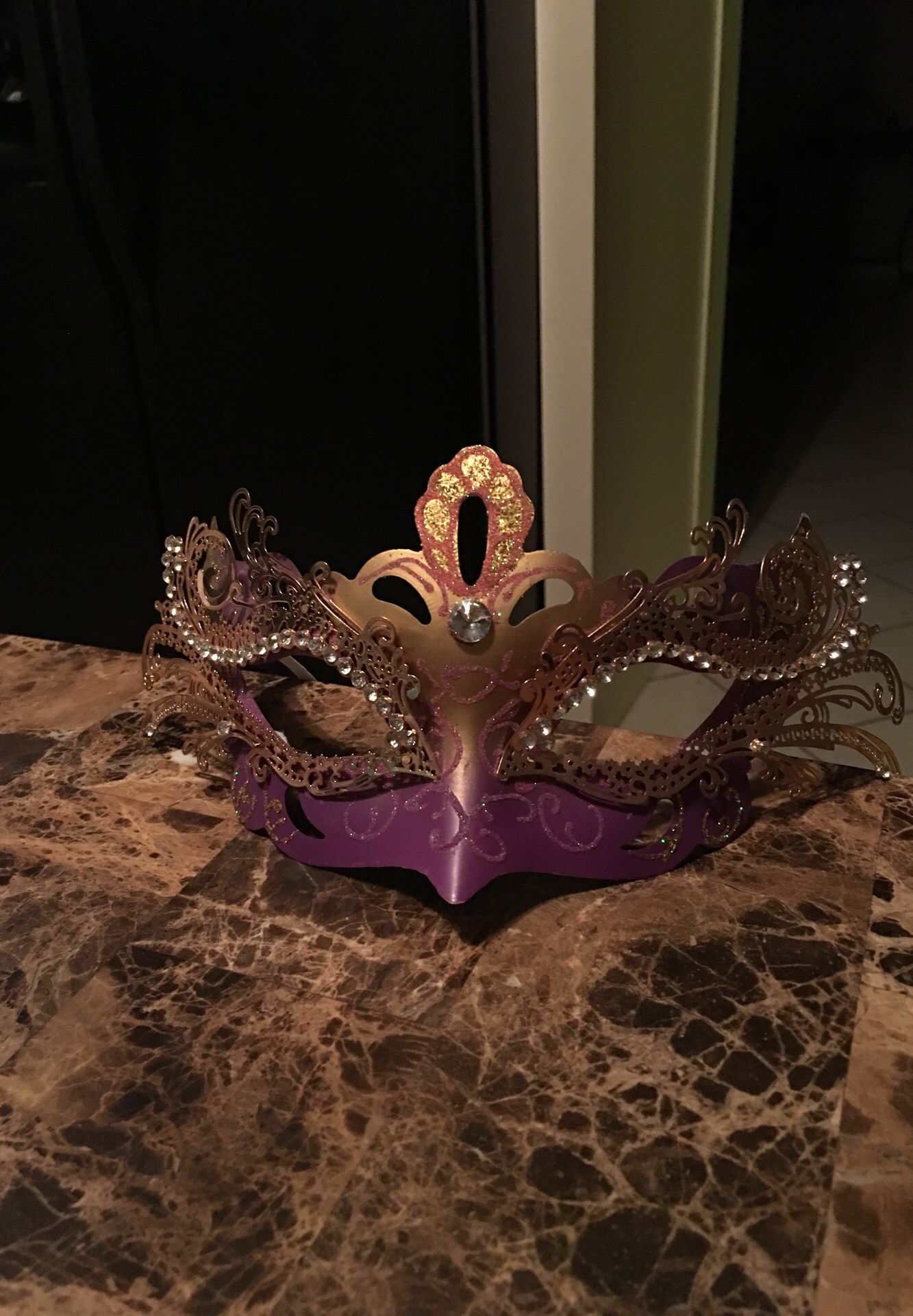 Gold and Pink Masquerade with jewel accents. Very beautiful in perfect condition. Purchased at Halloween store for $45