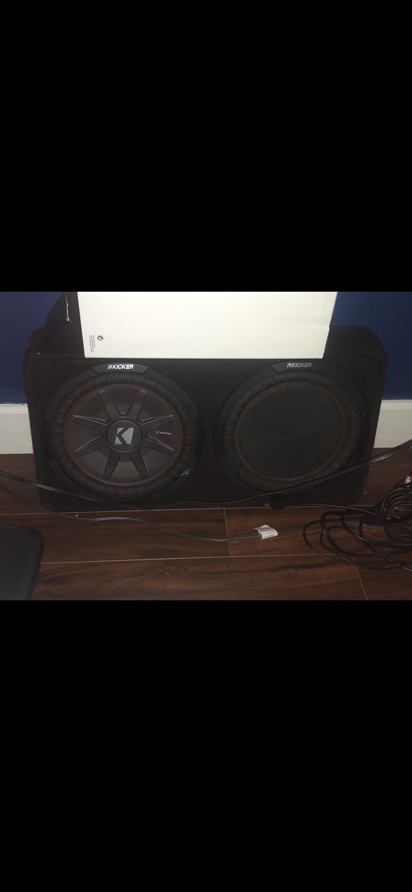 TWO 12s like new in box $150 two amps kicker$85