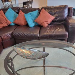 Brown Leather Couch And Glass Table