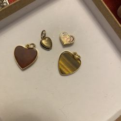 Three pendants one magnet clip, tigers, eye gold little heart