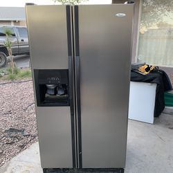 whirlpool refrigerator / Nellis and Owens 