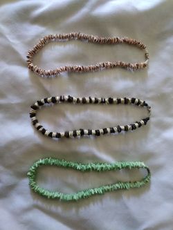 Three different Puka shell necklaces
