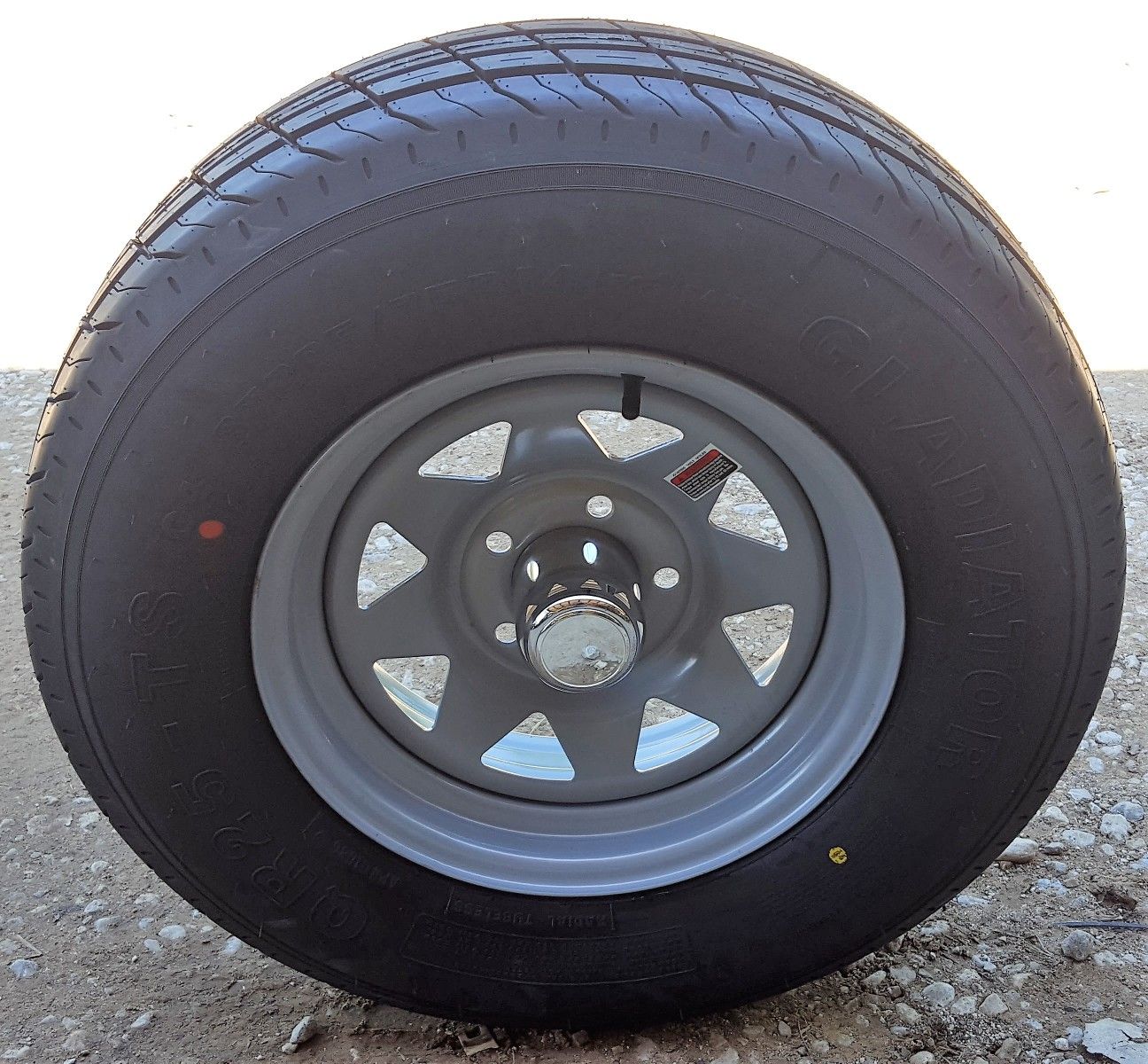 14" Gladiator Trailer Tire 2057514D / 14x5.5 5 Lug Silver Spk Wheel