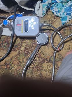 Portable thankless water heater for shower, grat for camping, or back yard pool shower, brand new. Never used, just plug in water, plug in power. And
