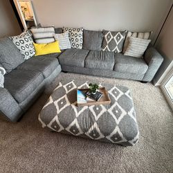 Sectional Sofa with ottoman and Living room side table with a lamp