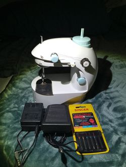 Mini Portable Sewing Machine.