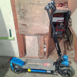 In Very Good Condition  BIKYDOM Scooter  Needs Charger Lost It In The  Move From Kansas To Here Retails For  $1,599 Selling For  $750 Or Best Offer 