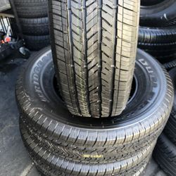 SET OF FOUR TIRES 245/75/17 BRIDGESTONE DULER SEMI NEW 95%TREAD LIFE 